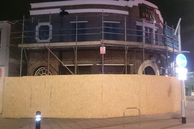 The boarded-up White Swan, in High Street, Cosham