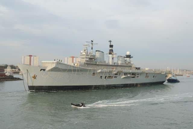 The former HMS Illustrious leaves Portsmouth for the final timePicture: Sarah Standing (161622-8242)