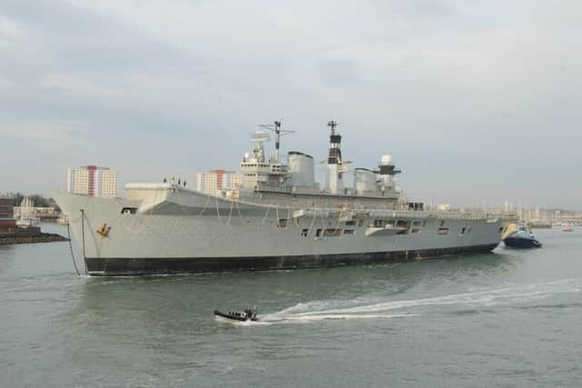 The former HMS Illustrious leaves Portsmouth for the final time

Picture: Sarah Standing (161622-8242)