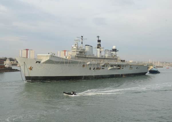 The former HMS Illustrious leaves Portsmouth for the final time

Picture: Sarah Standing (161622-8242)