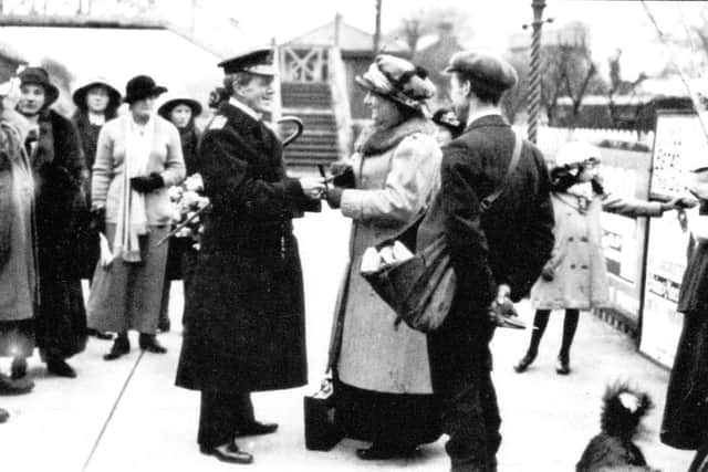 Vice-Admiral Sturdee is welcomed by villagers with a presentation at Droxford Station. 
Picture: Hampshire Record Office