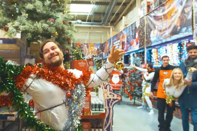 Staff dressed up as human Christmas trees and mannequins to celebrate their new range if items