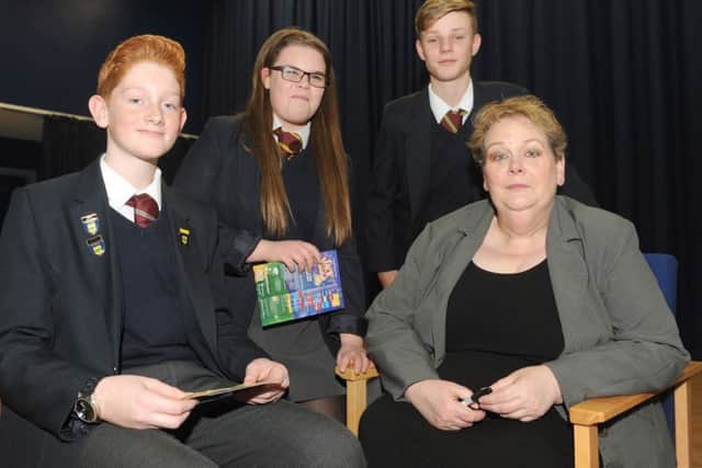 From left, Freddy Norman, Chloe Parsons and Lewis Curnow with Anne Hegerty Picture: Sarah Standing (161635-8910)