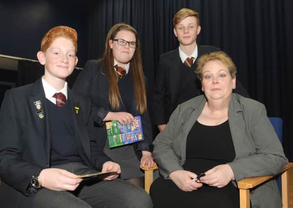From left, Freddy Norman, Chloe Parsons and Lewis Curnow with Anne Hegerty 

Picture: Sarah Standing (161635-8910)
