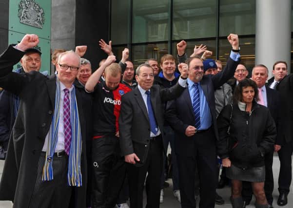 Ashley Brown, Mick Williams and Mark Trapani, alongside other members of the Portsmouth Supporters Trust, outside the Rolls Building in London. Inset: Administrator Trevor Birch with Iain McInnes