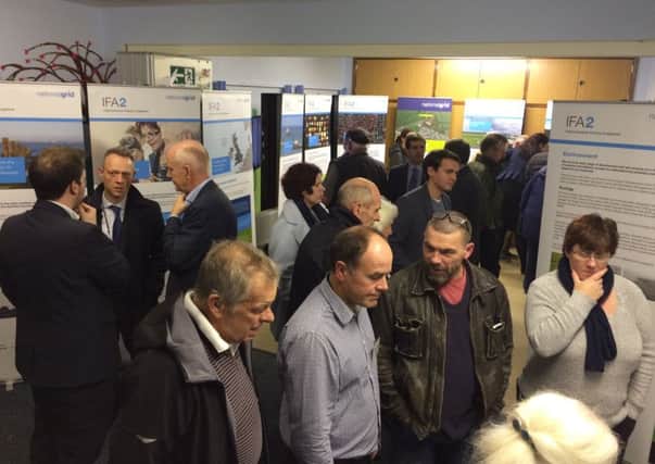 Residents looking at plans for the IFA2 link at Stubbington Baptist Church at an exhibition held by National Grid