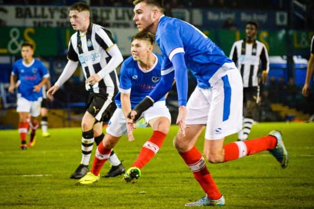 Jez Bedford goes close as Harvey Bradbury looks on Picture: Colin Farmery