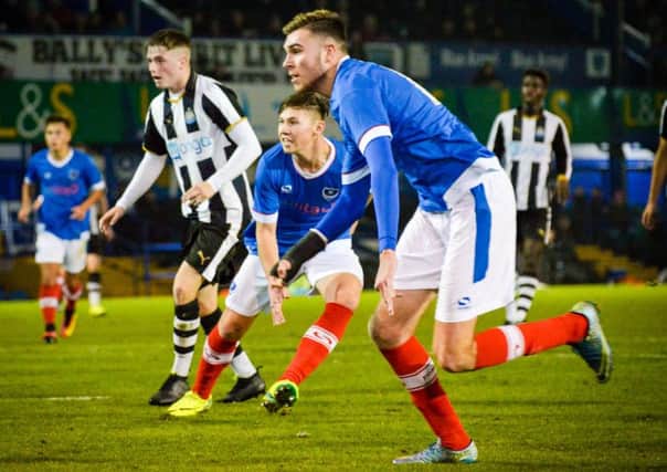 Jez Bedford goes close as Harvey Bradbury looks on Picture: Colin Farmery