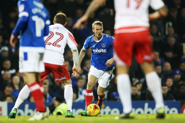 Carl Baker believes its harder for opposition defenders in League Two to contain three runners who operate behind a main striker