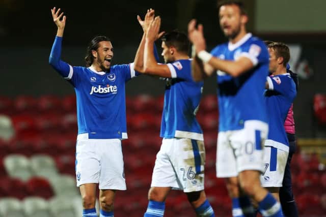 Christian Burgess celebrates Pompey's 1-0 win against Grimsby today. Photo by Joe Pepler/Digital South. PPP-161012-172157006
