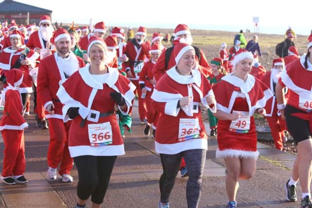 Lots of Santas descended on Portsmouth. .
Families and friends enjoyed running at the event
Picture: Habibur Rahman