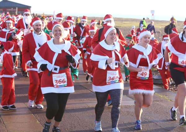 Lots of Santas descended on Portsmouth. .
Families and friends enjoyed running at the event
Picture: Habibur Rahman
