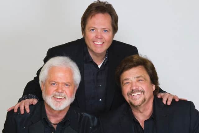The Osmonds come to Portsmouth. From left: Merrill, Jimmy and Jay Osmond.