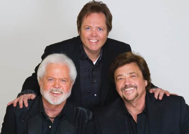 The Osmonds come to Portsmouth. From left: Merrill, Jimmy and Jay Osmond.