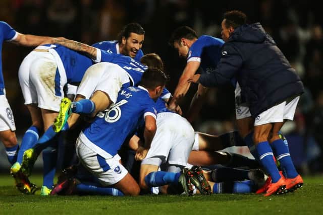 Pompey unity on display after Kal Naismith's winner at Grimsby Picture: Joe Pepler