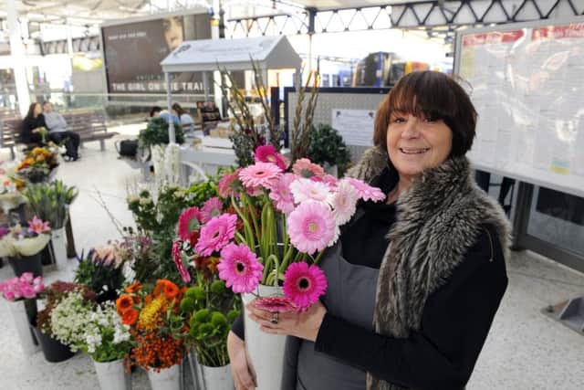 Donna Hooper, who runs Fleur Essence at Portsmouth and Southsea train station Picture: Malcolm Wells (161010-0346)