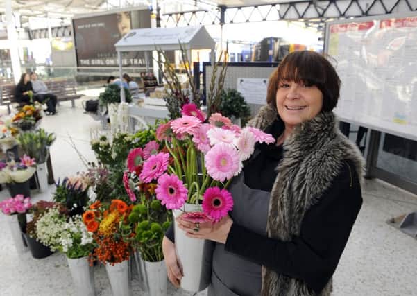 Donna Hooper, who runs Fleur Essence at Portsmouth and Southsea train station Picture: Malcolm Wells (161010-0346)