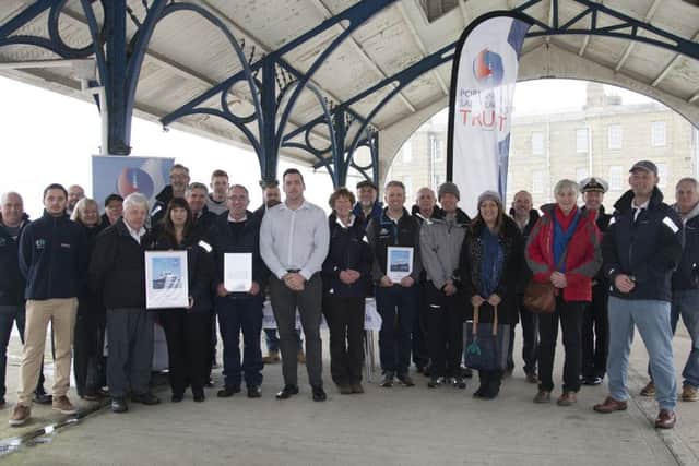 Tthe BAE Systems project team that co-ordinated the restoration, with representatives from the PSTTS,  representatives from industry who helped, and Rear Admiral Paul Bennett, RN,  who handed a plaque to BAE Systems Alan Dorricott to mark the official handover Picture: BAE Systems