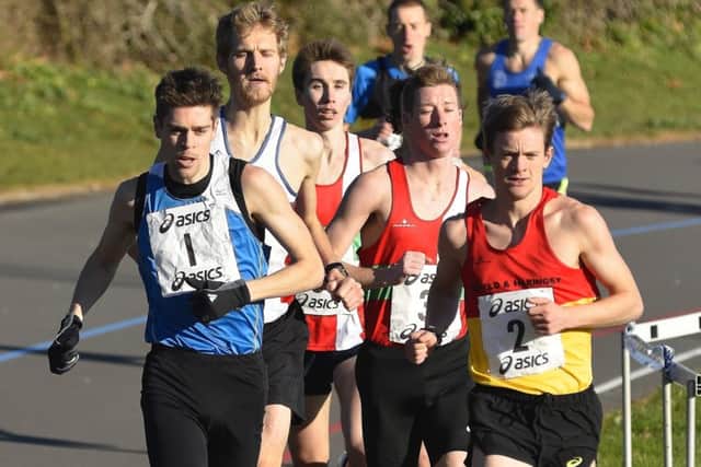 Alex Teuten, second from the left, in the lead group with winner Matt Sharp, right, during the Victory 5. Picture: Neil Marshall
