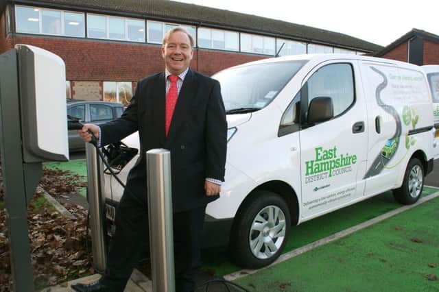 Councillor Adam Carew with the councils new energy-efficient electric courier van