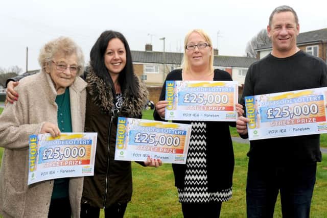 Patricia Jarman, Sasha Geddei-Nabbei, Lorraine Lawton and Martin Ray with their £25,000 cheques