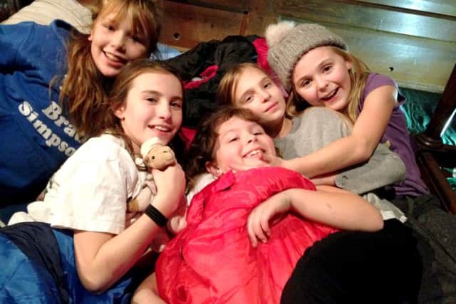Meggie Dolton, Abigail Fawcett, Harriet Henty, Megan Fawcett and Lily Hammal at at the Advent sleepout in All Saints Church, Botley