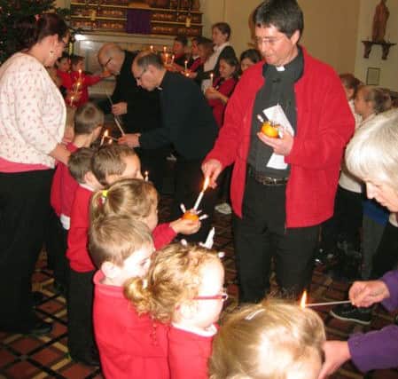 Rev Andy Davis at the recent Christingle service