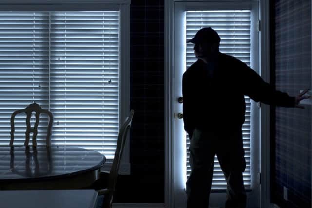An actor posing as a burglar