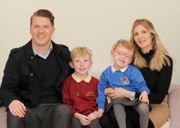 (L-r) James Ford and his wife Krista with their children Luca (7), and four-year-old Isie Picture: Sarah Standing (161706-4859)