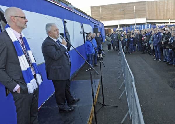 From left,  Pompey club director Ashley Brown and chairman Iain McInnes unveil the Wall of Fame at the weekend