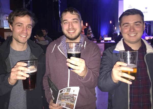 From left, University of Portsmouth students Clement Dallard, from France, Phil Lentz, from Denmead and Jake Smith, from Essex, at the Portsmouth Beer Festival Picture:

Loughlan Campbell