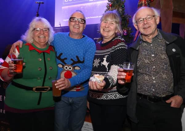 From left, Lin and Kevin Garwood and Sally and Tony Kerr at Portsmouth Christmas Beer Festival 
Picture: Habibur Rahman (161677-610)