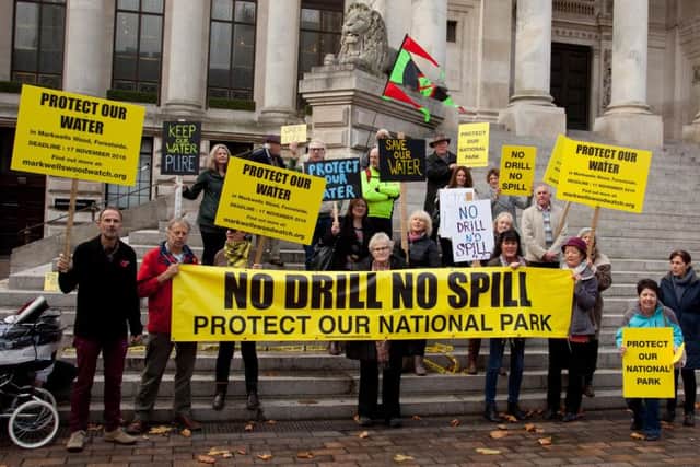 Markwells Wood Watch protested against the proposed oil drilling outside Portsmouth Guildhall last month