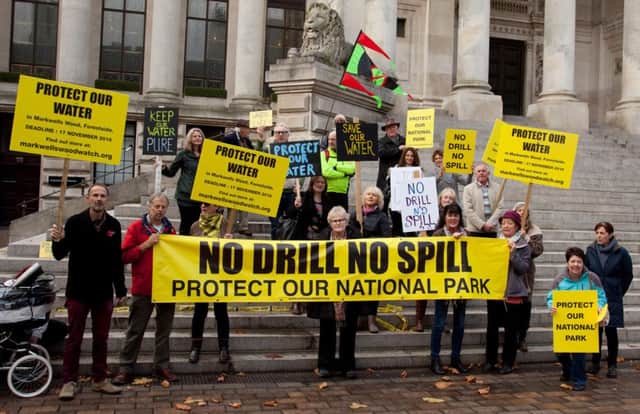 Markwells Wood Watch protested against the proposed oil drilling outside Portsmouth Guildhall last month
