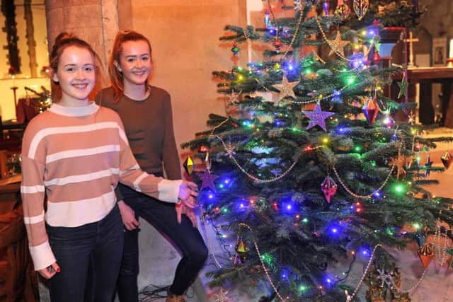 Twin sisters Hazel, left, and Megan Lee, 14, from Fareham at St Peter and St Paul Picture: Ian Hargreaves (161365-3)