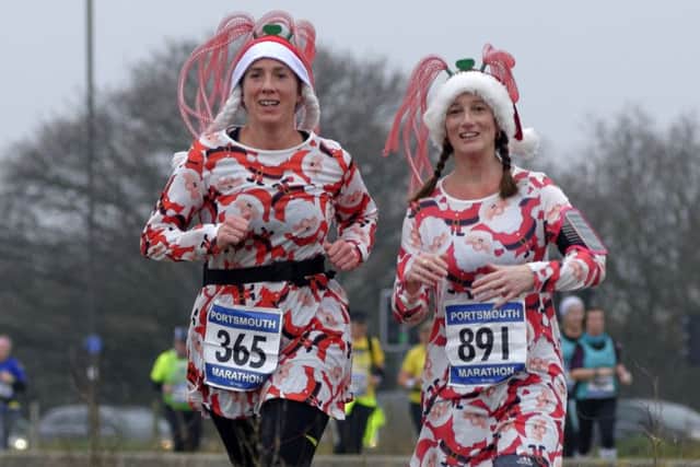 Pauline Dorn, left, and Louise Newman enjoying the Portsmouth marathon. Picture: Neil Marshall