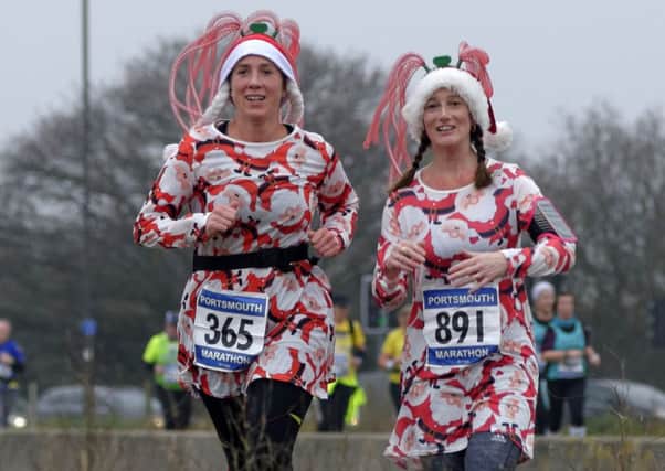 Pauline Dorn, left, and Louise Newman enjoying the Portsmouth marathon. Picture: Neil Marshall
