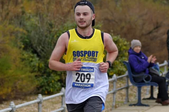 Harry Carter finishes third in the Portsmouth marathon. Picture: Neil Marshall