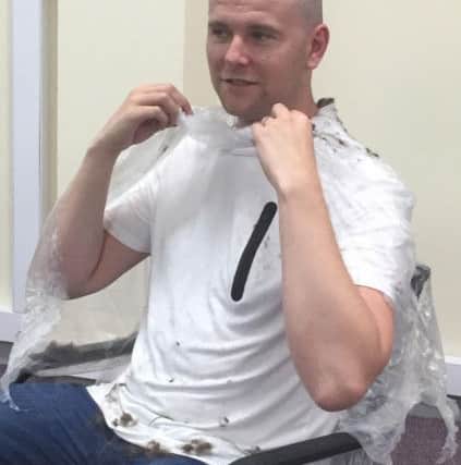 Lee after his head was shaved