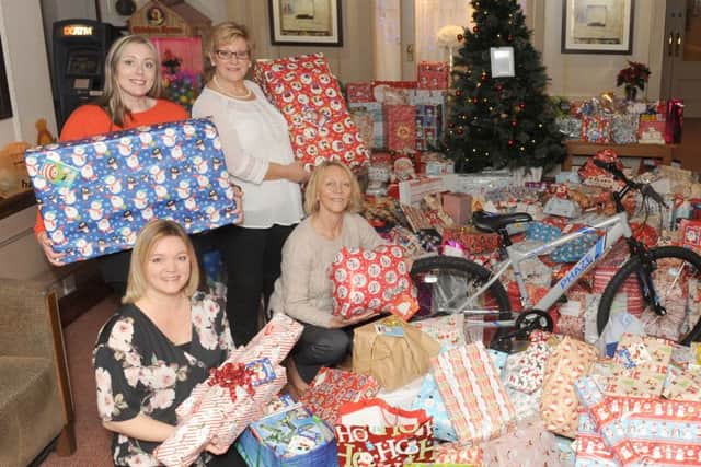 From left, Beth Heritage and Yvonne Carter from Southern Domestic Abuse with, front from left, Debbie Ledgister and Carole Jenkins Picture: Sarah Standing (161711-9466)