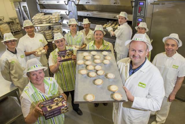 Ian Connolly and the bakery team with mince pies at Asda in Bedhampton