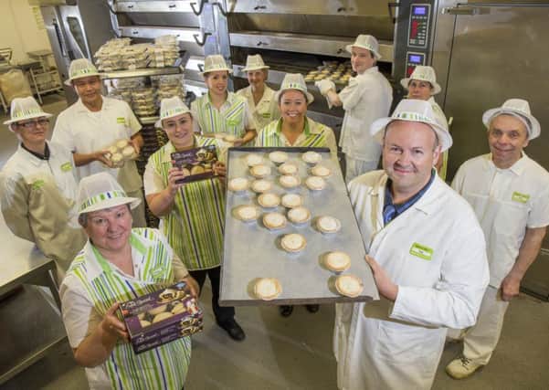 Ian Connolly and the bakery team with mince pies at Asda in Bedhampton