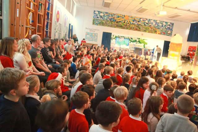 Mill Rythe Junior School pupils watch the panto