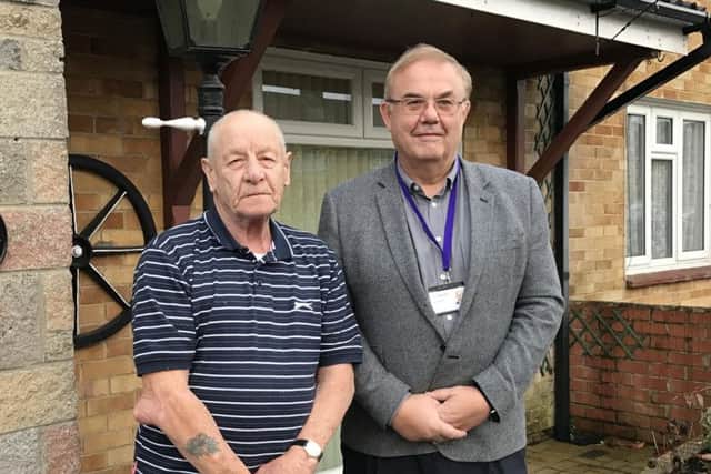 Havant Ukip group leader John Perry with
Joe Slack, 77, who was unaware of the new parking system at Havant Health Centre