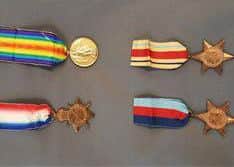 Medals similar to those that have been stolen. Four people from Portsmouth have been arrested in conection with the theft.