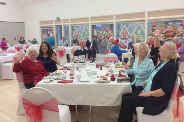 Volunteers enjoy a fun festive lunch at Portchester Community Centre as a big thank you