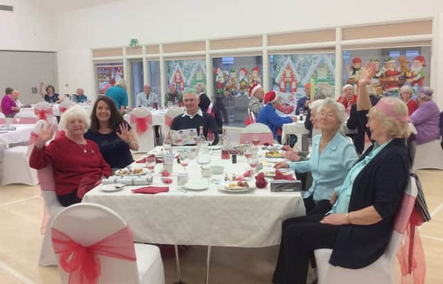 Volunteers enjoy a fun festive lunch at Portchester Community Centre as a big thank you