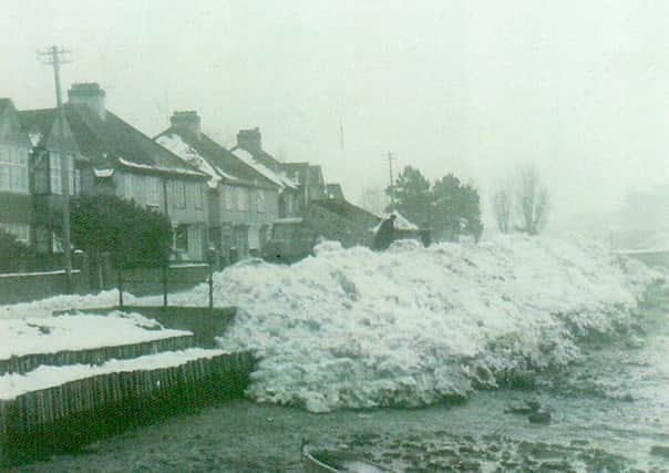 A city council lorry dumping snow from Portsmouth streets in Portcreek, Cosham, December 1962.