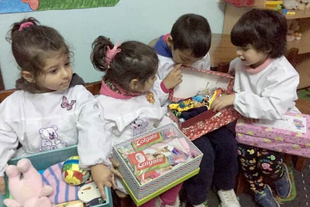 Youngsters can't wait to open their presents