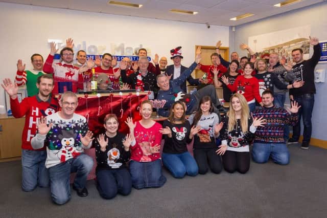 Staff at Taylor Made Computer Solutions in their Christmas jumpers